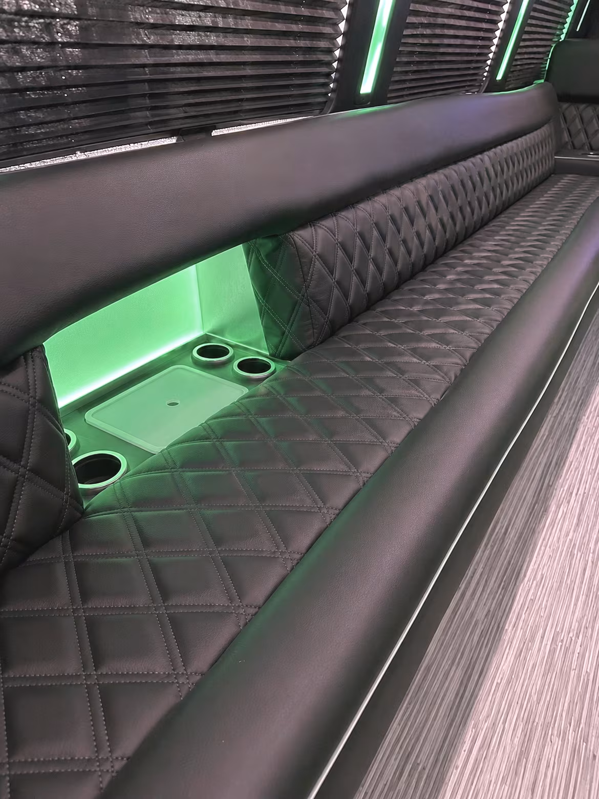 Wedding guests seated inside a party bus serving Minneapolis